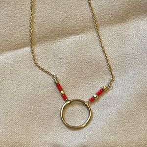Gold plated necklace with red beads